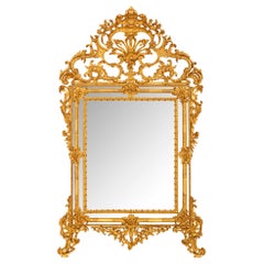 Miroir baroque italien du milieu du 19e siècle en bois doré à triple encadrement