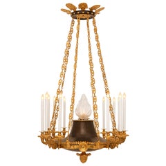 Lustre français du 19ème siècle d'époque Charles X en bronze patiné et métal doré