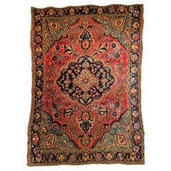 Antique Persian Sarouk in Floral Design with Turquoise, Navy Blue, Red Colors