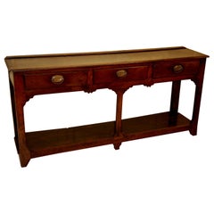 Welsh 18th Century Oak Pot Board Low Dresser with Silhouette Legs, Three Drawers