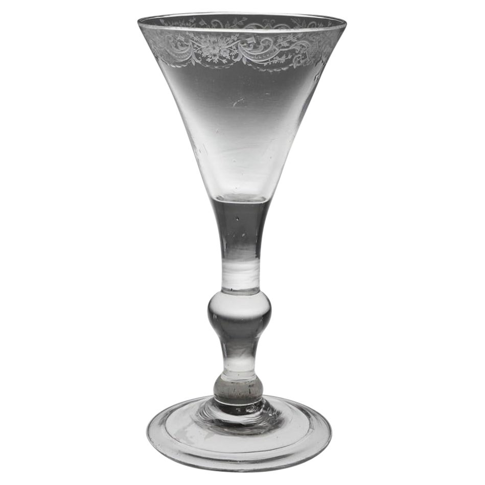 An Early Rococo Engraved Balustroid Wine Glass, c1730-40