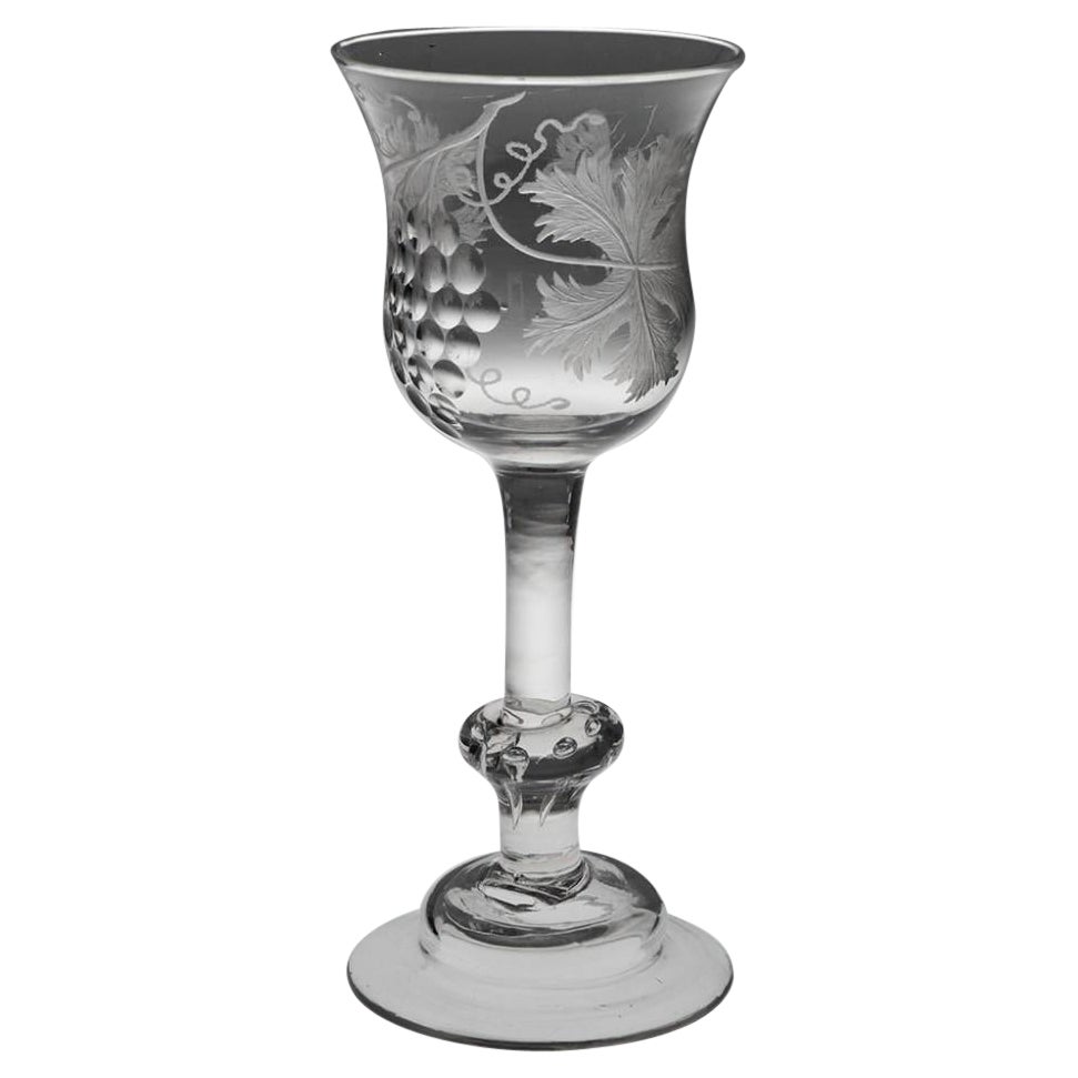 Copa de vino balustroide georgiana grabada, c1740