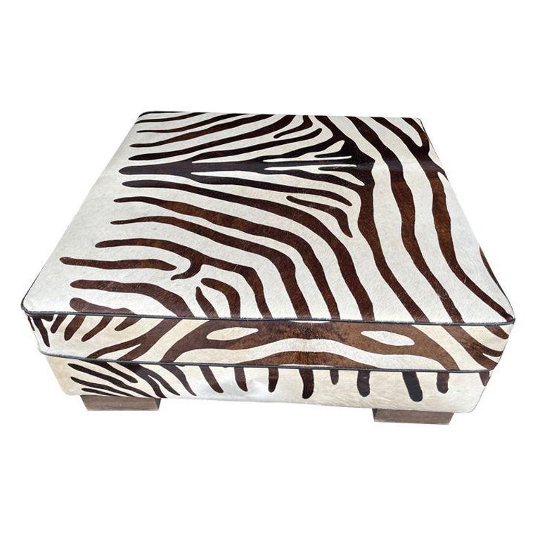 Cowhide Covered Ottoman with Printed Zebra Skin Design