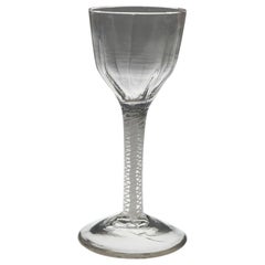 A Rib Moulded Opaque Twist Wine Glass, c1760