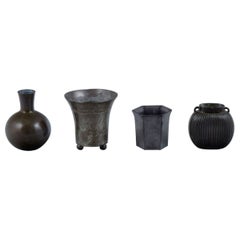Just Andersen, Denmark, Four Vases in Disco Metal and Pewter, 1920-1930s