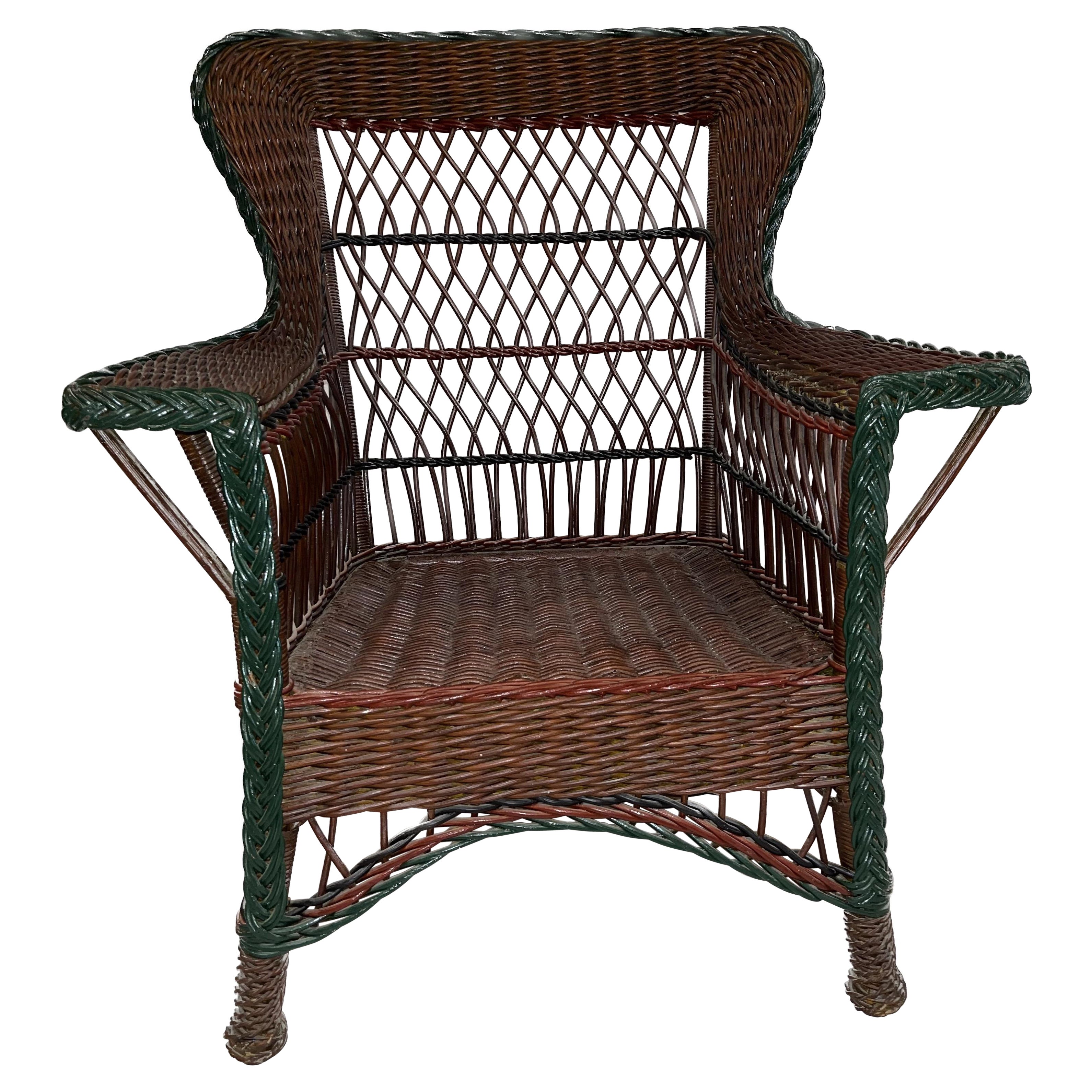 Bar Harbor Style Wicker Wing Chair in Natural Finish with Green Trim