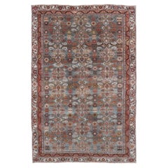 Bidjar persan ancien au design géométrique, fond bleu-gris et multicolore