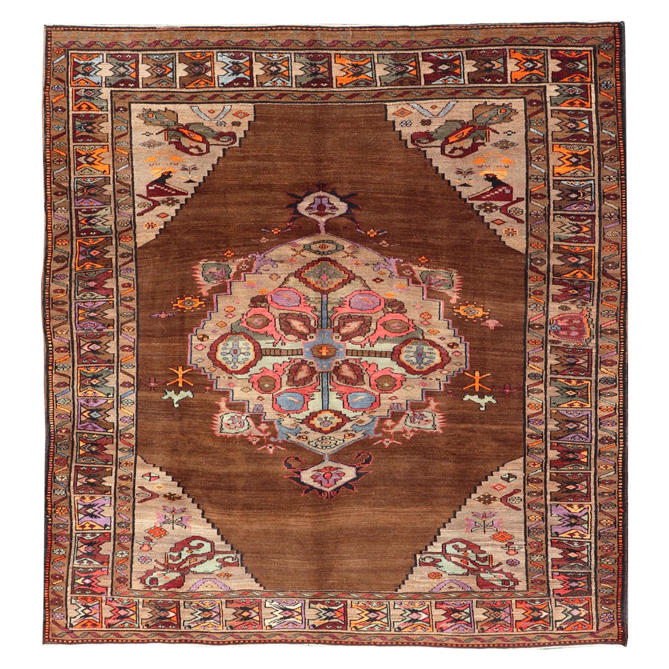 Vintage Turkish Kars Rug With Medallion On A Brown Field with Pops of Color  For Sale