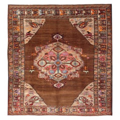 Vintage Turkish Kars Rug With Medallion On A Brown Field with Pops of Color 