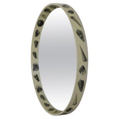 Miroir circulaire à la manière de Fornasetti, d'Italie 1950.