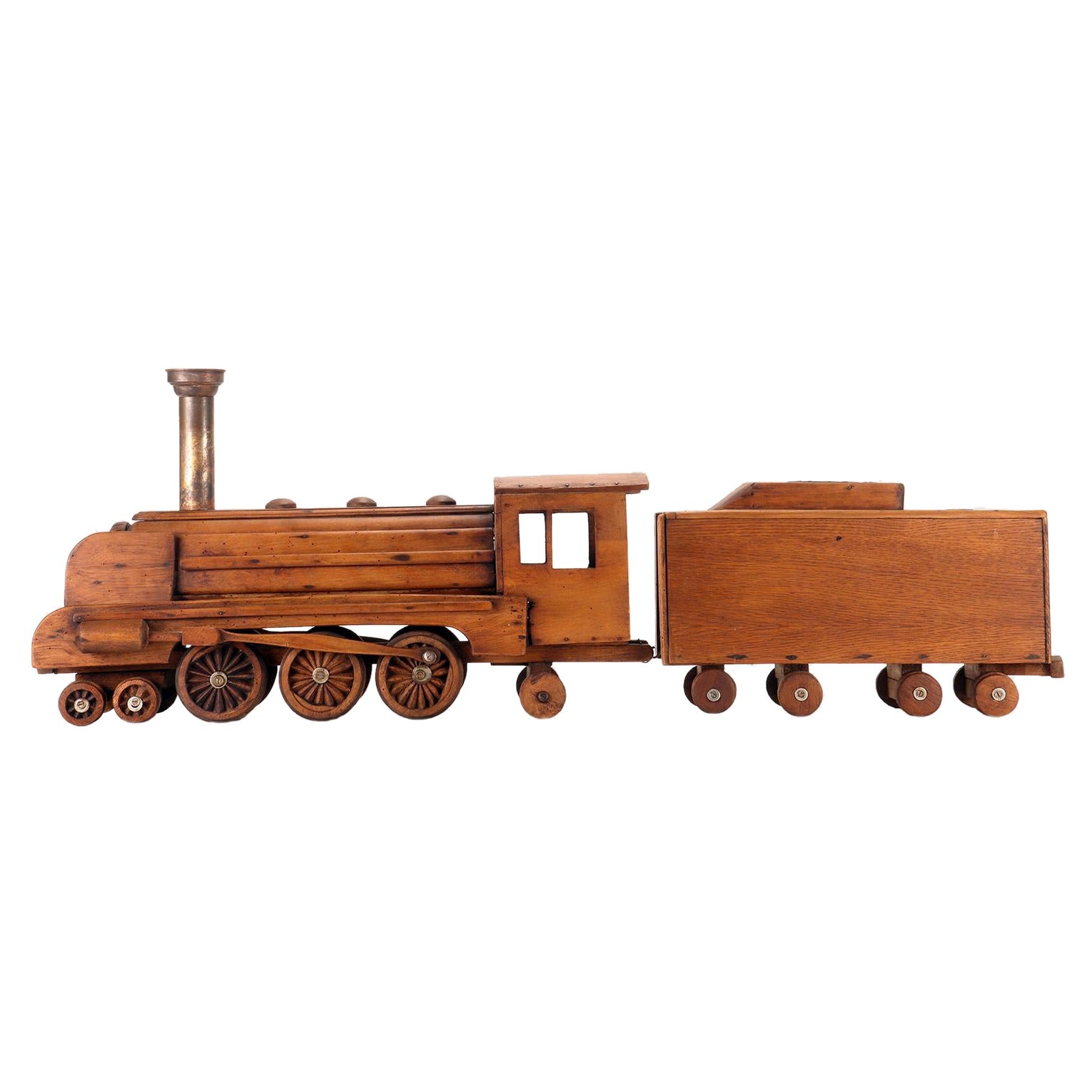 Ein Volkskunstmodell eines Spielzeugs, das eine Dampfzug darstellt, USA 1900. im Angebot