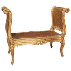 Antique Circa 1870 Sculpted Louis XV Style Giltwood and Caned Banquette from France