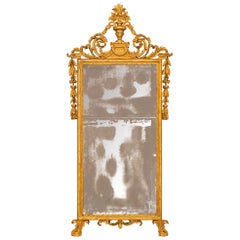 Miroir italien du 18ème siècle en bois doré de style Louis XVI