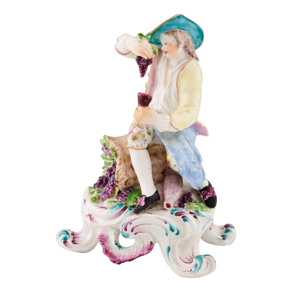 Bow Porcelain Figure - Seated Rustic Seasons - the Autumn Vendangeur, c1765 For Sale