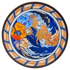A Wood and Sons Wall Plaque by Charlotte Rhead, c1920
