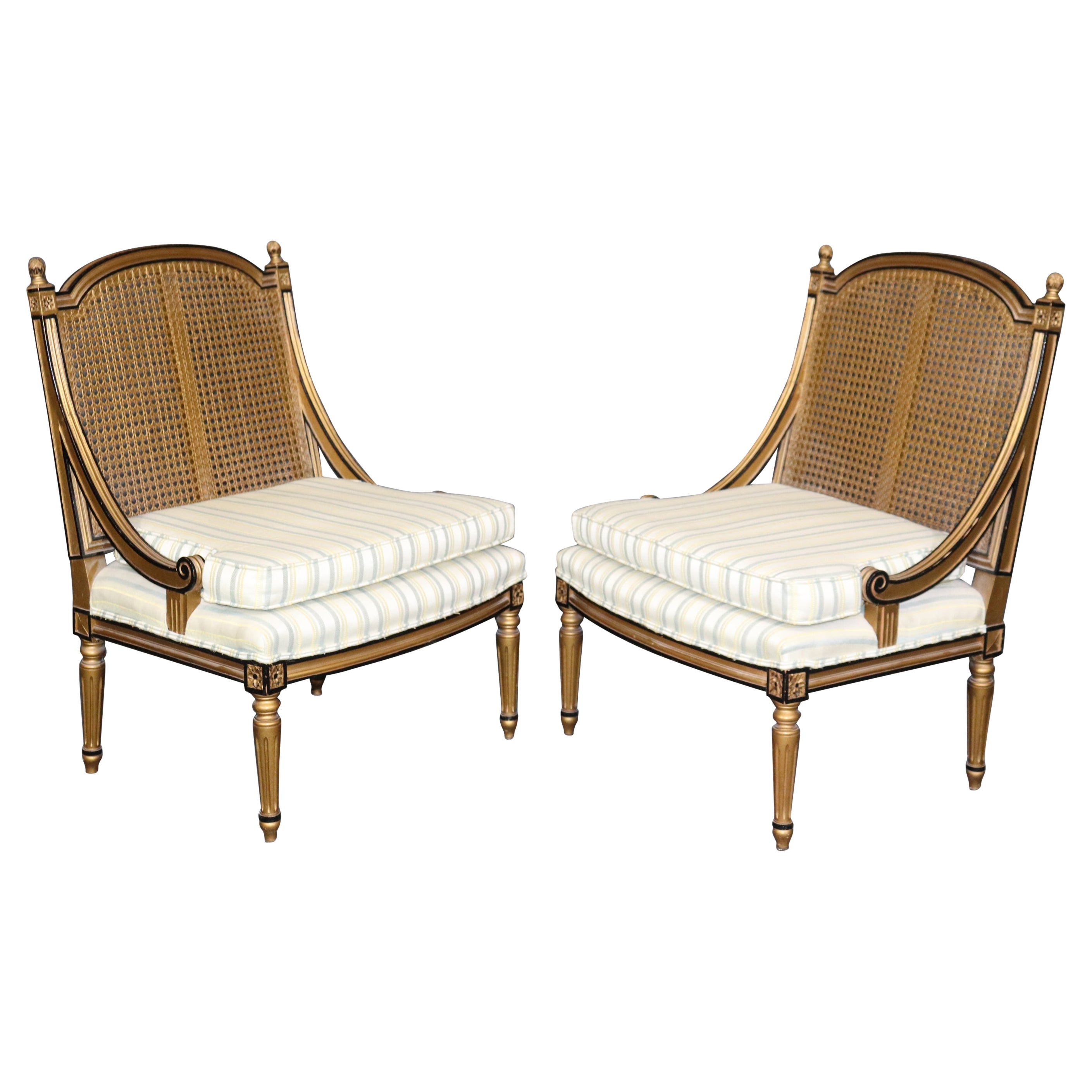 Pair of French Louis XVI Style Black and Gold Cane Back Bergeres, Lounge Chairs For Sale