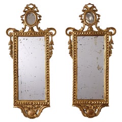 Paire de  Miroirs néoclassiques en bois doré Antique