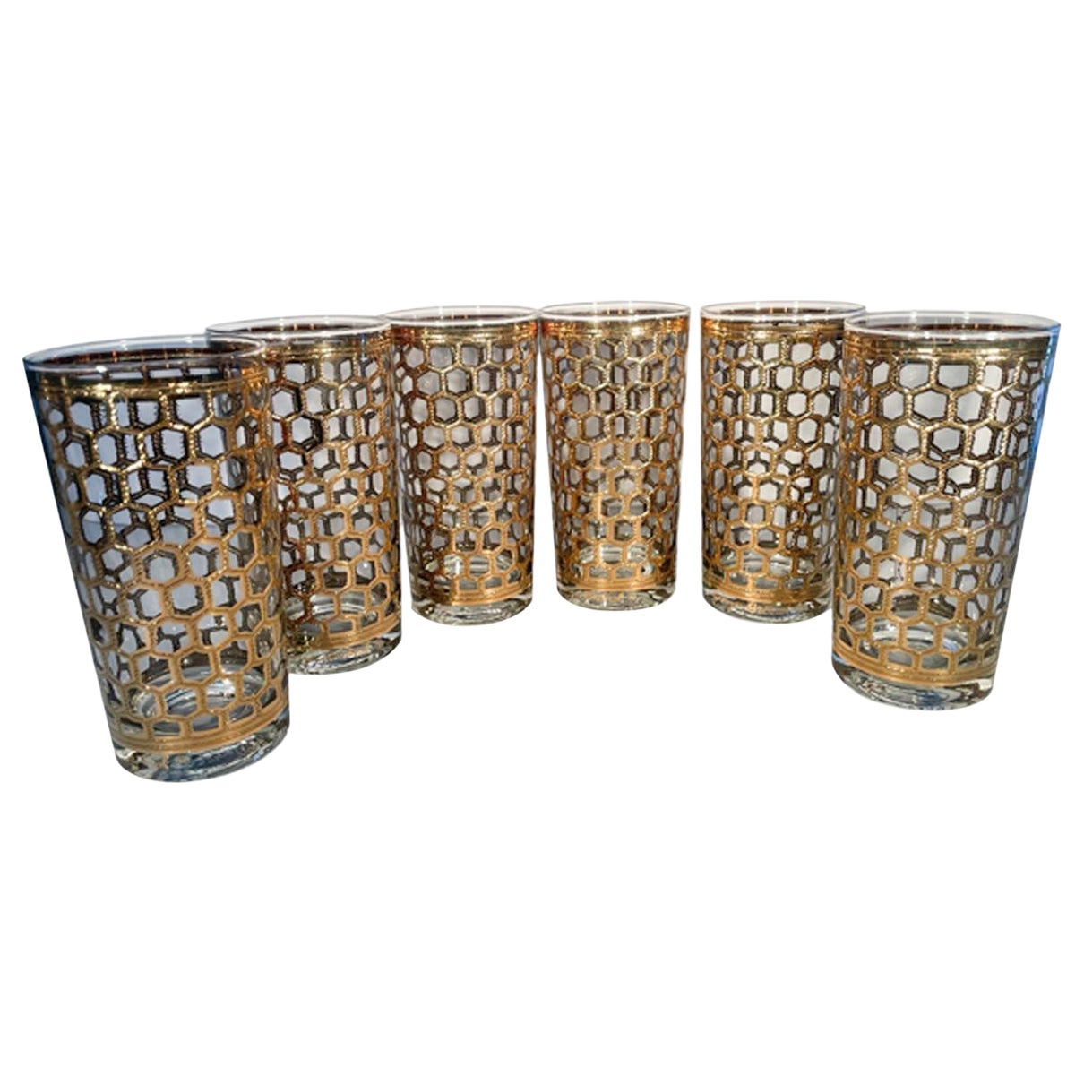 Six verres longs Georges Briard en or 22 carats à motif « fil »