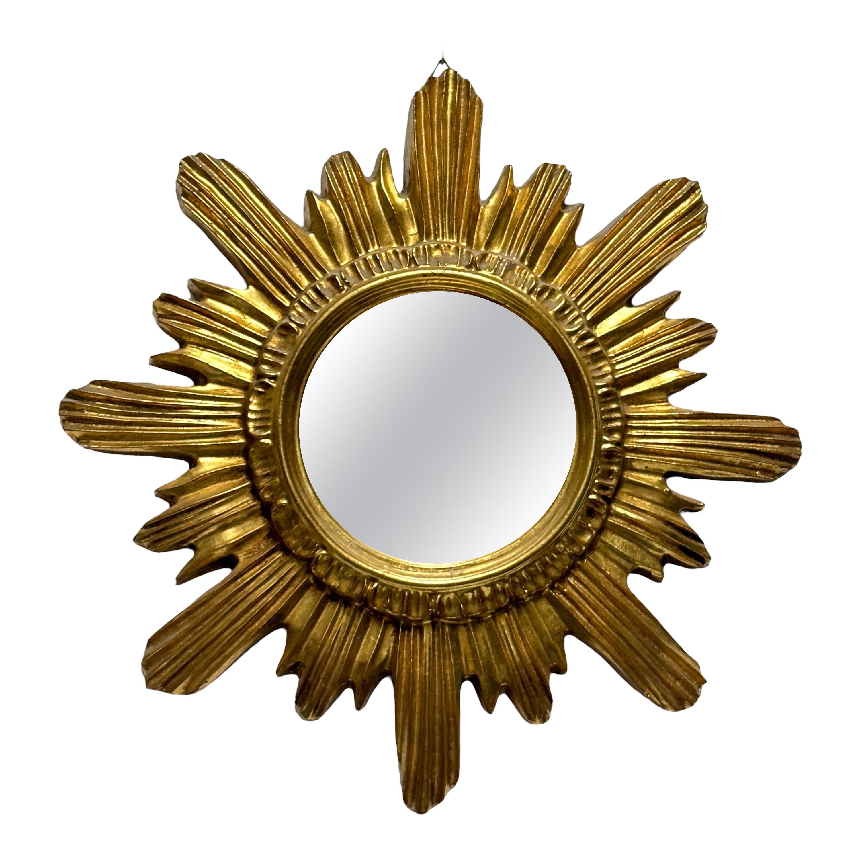 Magnifique miroir en forme d'étoile en résine dorée Stuc, Italie, vers les années 1960.