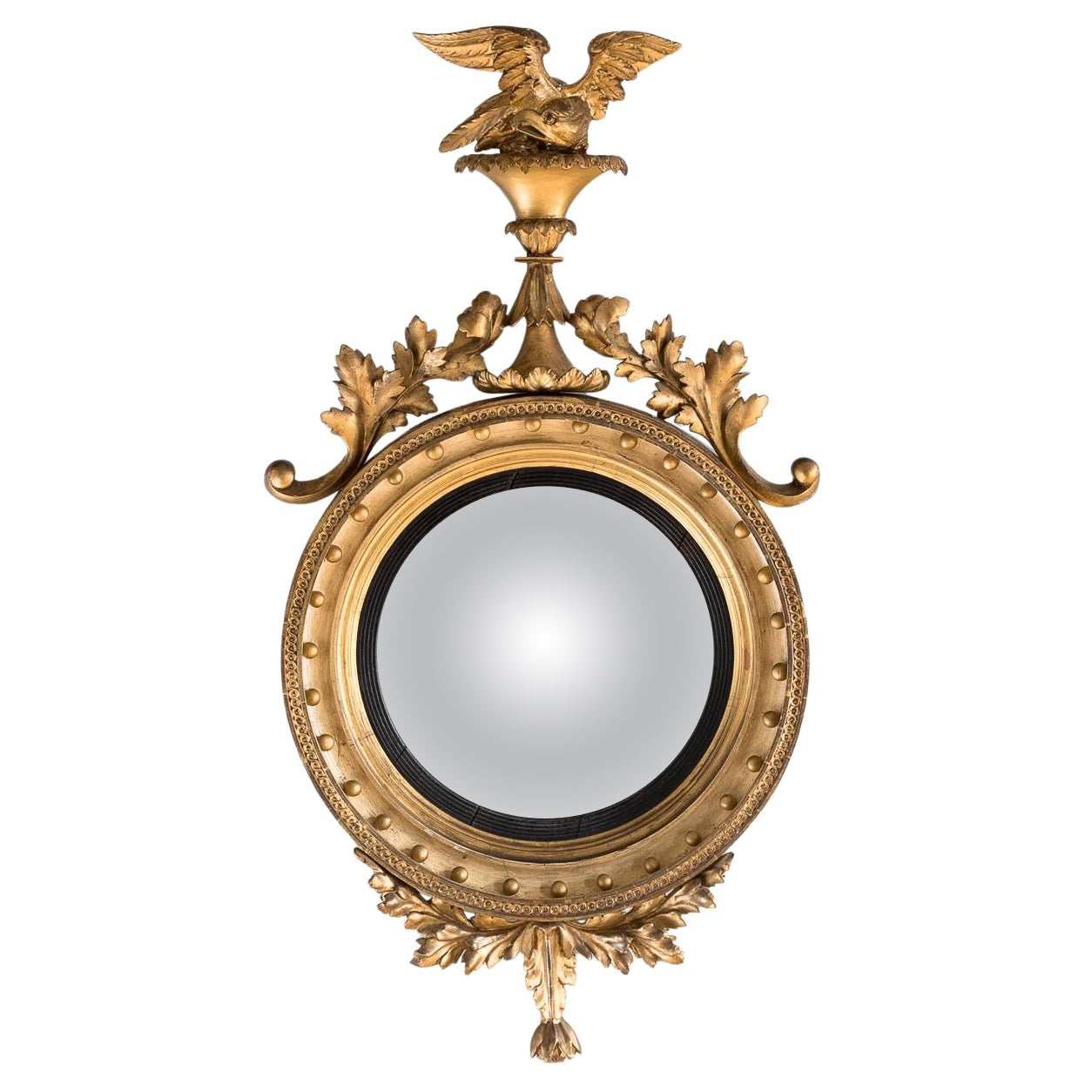 Miroir convexe Regency en bois doré en vente