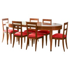 Table en bois à rallonge avec 6 chaises en bois avec coussin en velours rouge Dedar