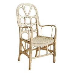 Vintage Painted Rattan Armchair with Curved Details, France, Early 20th Century