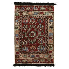 Rug & Kilim's Antique Tribal Style rug in Red, Blue, Green & Black Patterns (tapis ancien de style tribal à motifs rouges, bleus, verts et noirs)