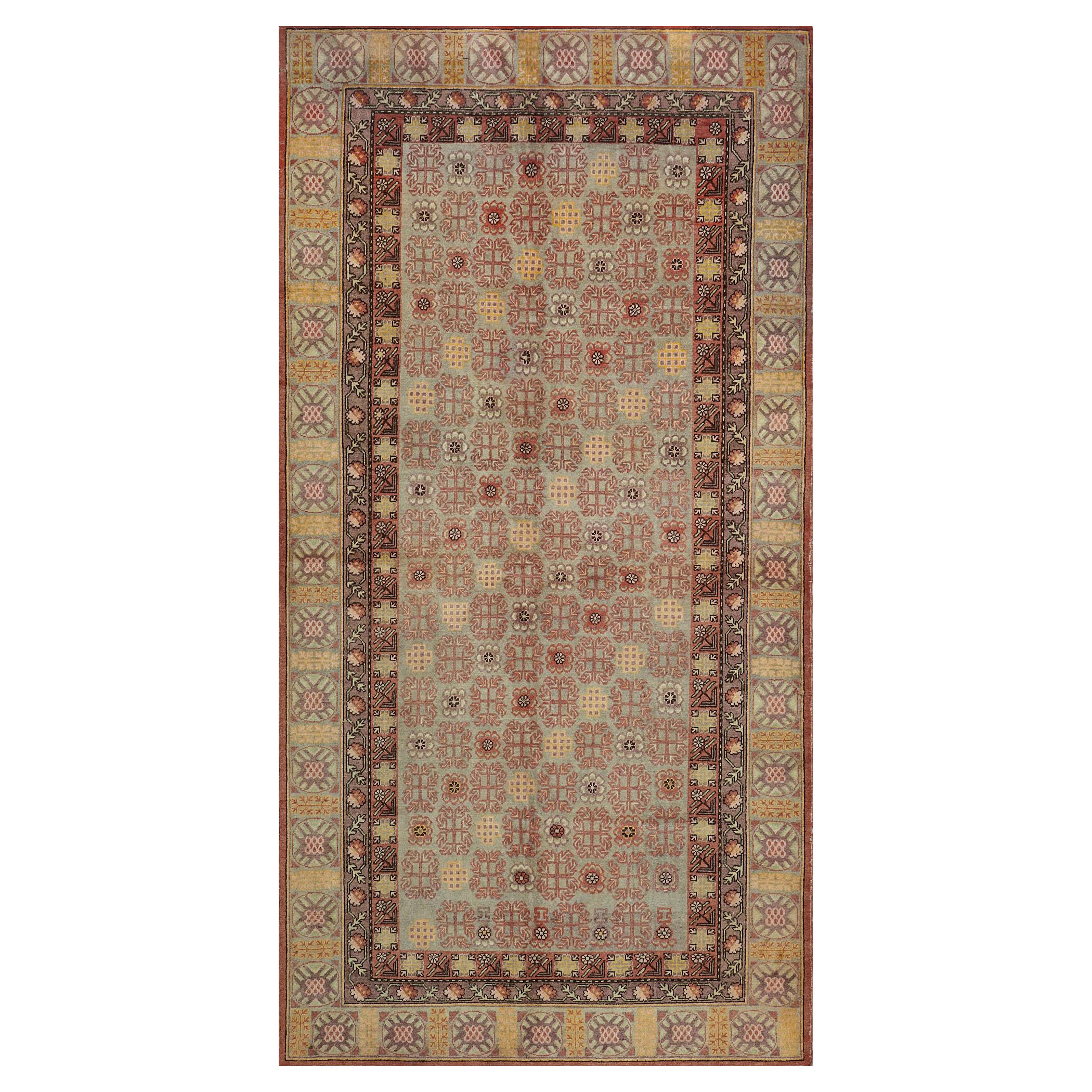 Alfombra antigua Khotan de lana anudada a mano