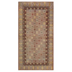 Antiker Khotan-Teppich aus handgeknüpfter Wolle