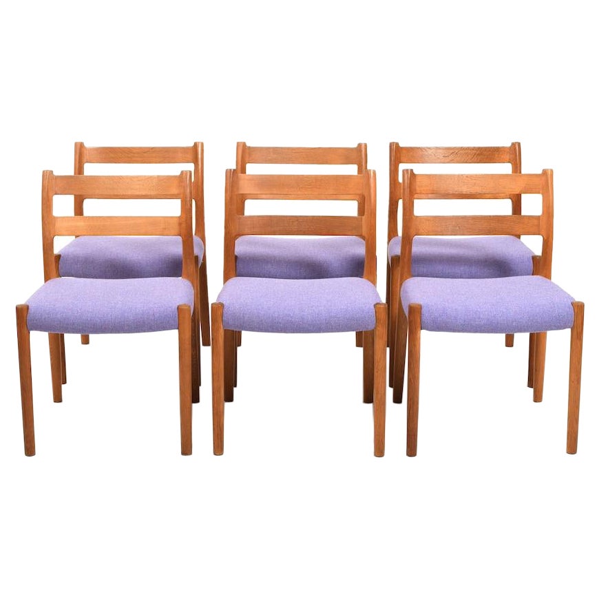 Niels O. Møller Chairs Mod.84 / New Upholstered For Sale