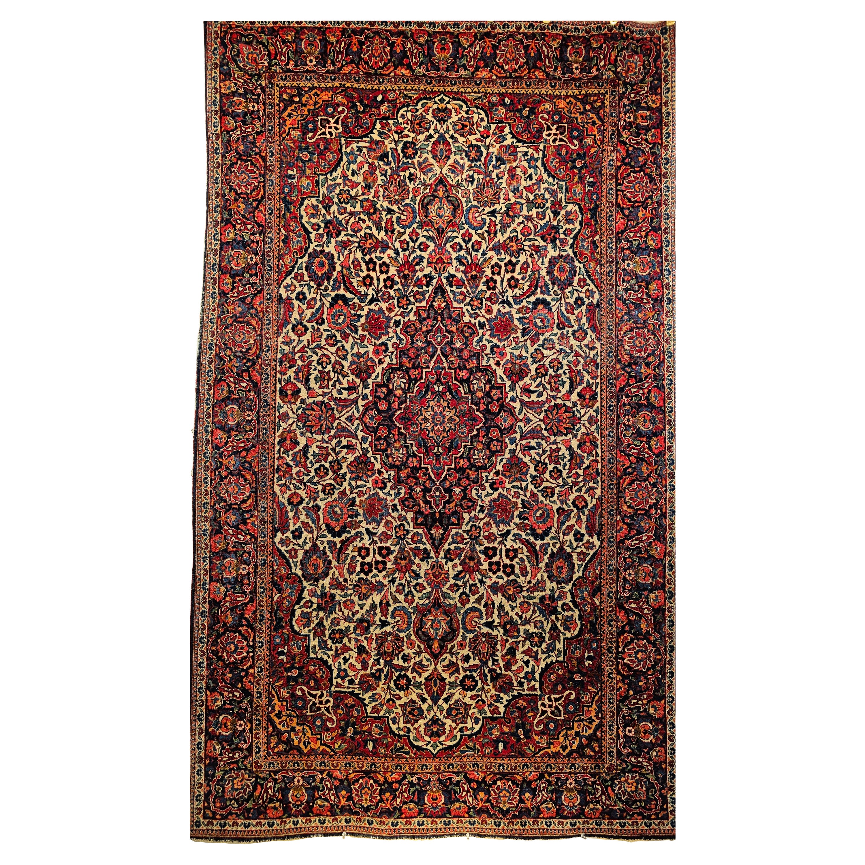 Early 20th Century Persian Kashan in Floral Design in Ivory, Navy Blue, Red For Sale