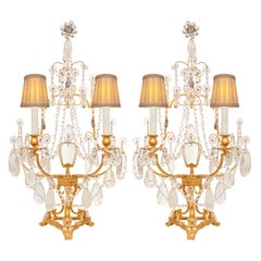 Paire de lampes Girondoles en cristal de roche et bronze doré de style Louis XVI du XIXe siècle