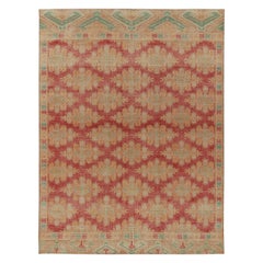 Rug & Kilim’s Distressed Bokhara Style Rug in Red, Beige & Gold Medallions