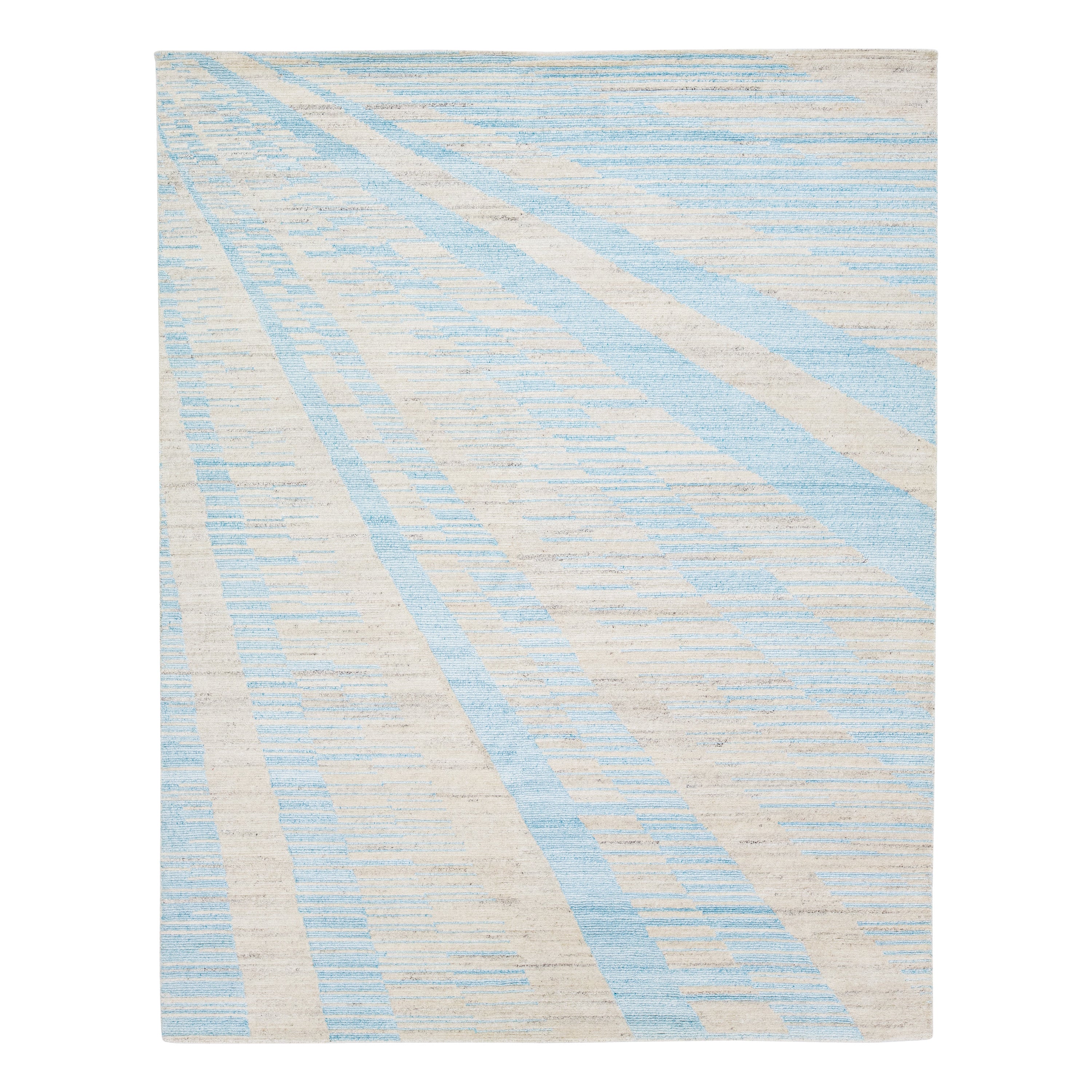 Art Deco Modern Handmade Wool Rug with Beige and Blue Design For Sale