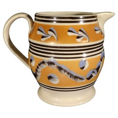 Antique English Yellow Mocha Jug with Leaf, Earthworm and Cat's Eye Designs