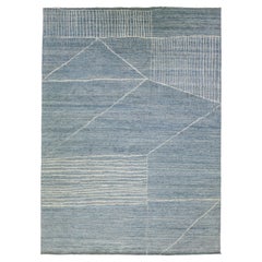 Tapis géométrique en laine de style marocain bleu fait à la main par Apadana