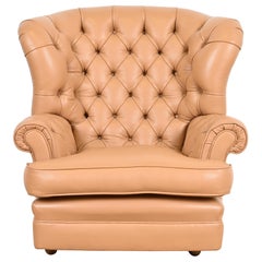 Fauteuil de salon vintage Chesterfield Wingback en cuir touffeté