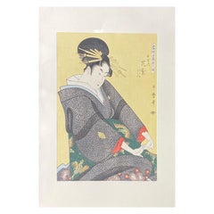Stampa su legno giapponese di una geisha di Edo con forcine e kimono giallo