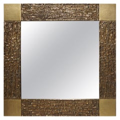 Miroir entouré de bronze texturé, par Frigerio