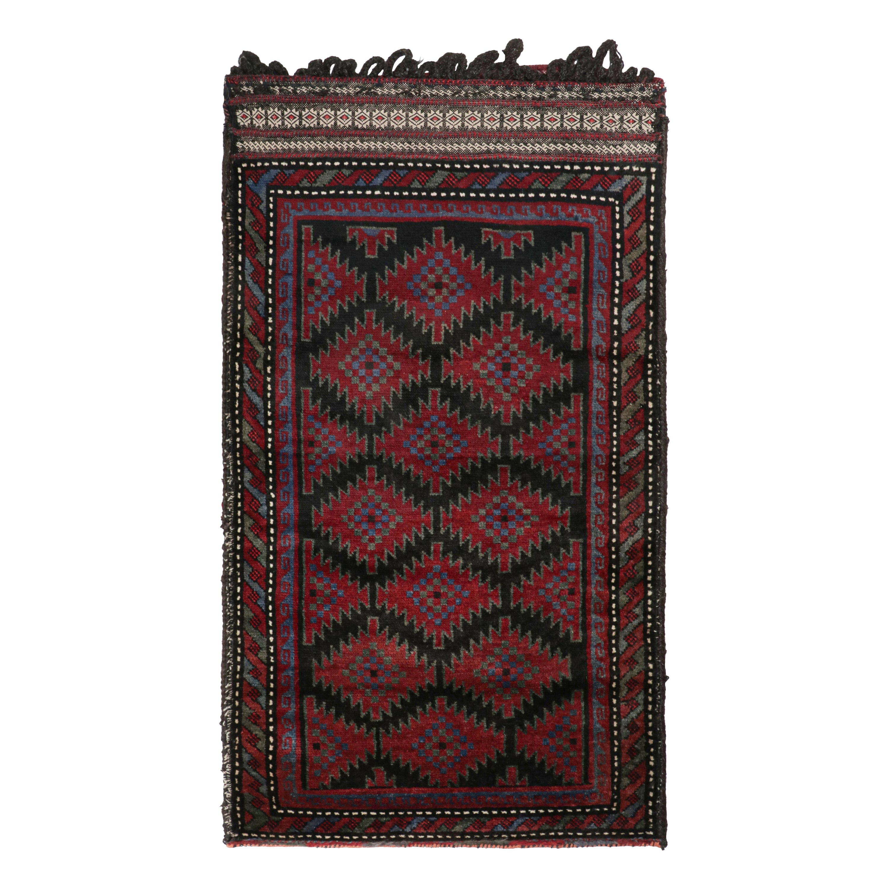 Vintage Baluch Perserteppich in Schwarz & Rot Stammes-Muster von Rug & Kilim