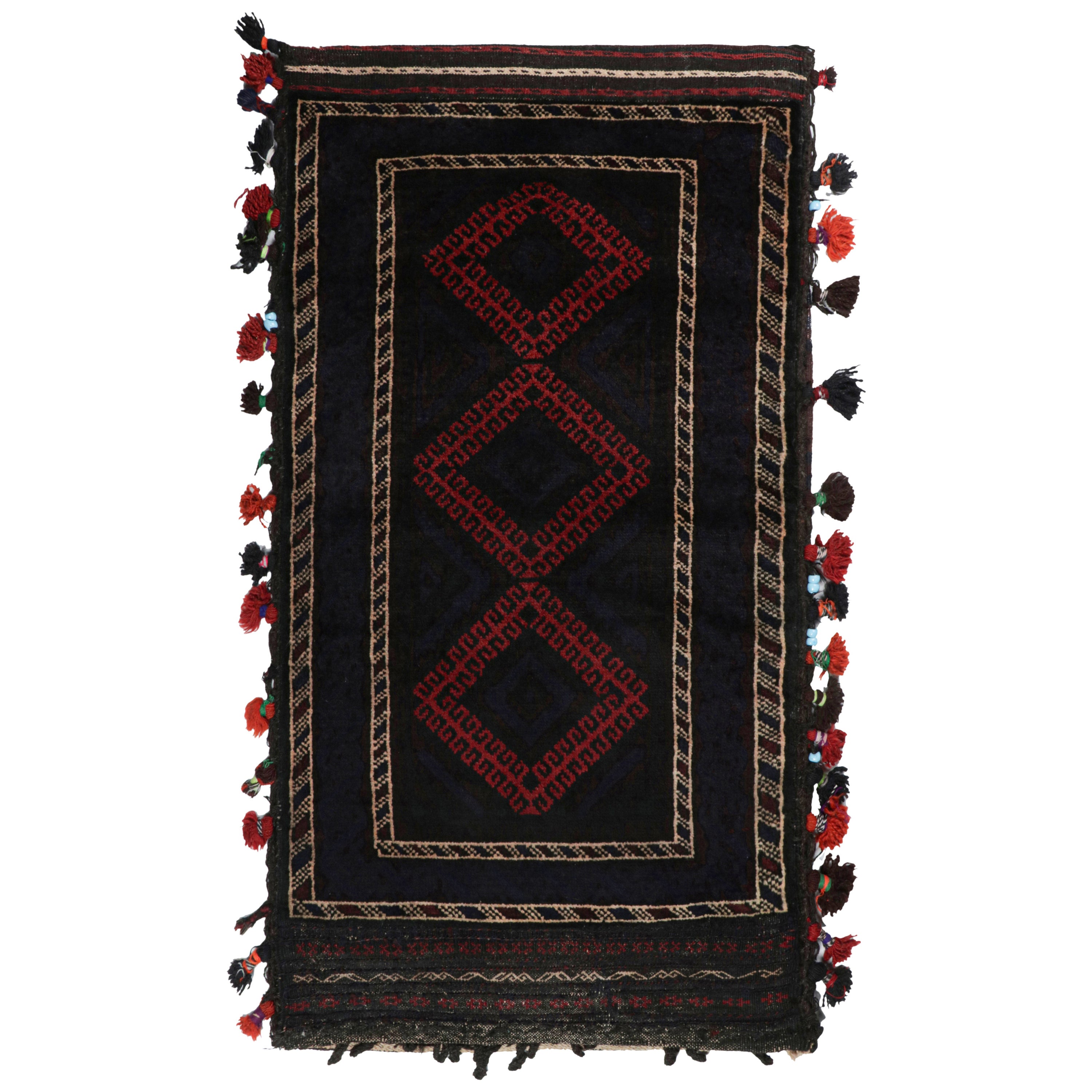 Vintage Baluch Persian rug in Black & Red Tribal Patterns from Rug & Kilim For Sale