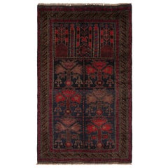 Tapis persan Baluch vintage à motifs graphiques rouges et bleus de Rug & Kilim