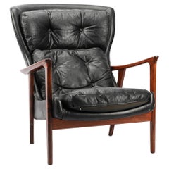 Vintage "Bracil" Wingback Lounge Chair in Rosewood by Inge Andersson