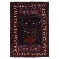 Tapis persan vintage Baluch en bleu avec des motifs rouge-brun de Rug & Kilim