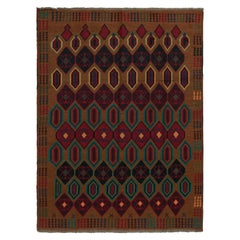 Rug & Kilim’s Baluch Tribal Rug in Rust Tones with Colorful Hexagon Patterns