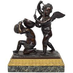 Fantastic Patinated and Gilt Bronze Figural Group of Cherubs Playing Drums