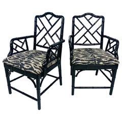 Used Regency style black Lacquered faux bamboo arm chairs/pair