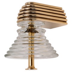 The Insulator 'A' Sconce in polished brass and clear glass by NOVOCASTRIAN deco