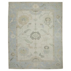 Türkischer Oushak-Teppich aus handgewebter Wolle mit blauem Blumenmuster 7'11" x 9'11"
