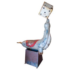 Hand-Painted Iron Seal Sculpture of a Carousel playing with dice
